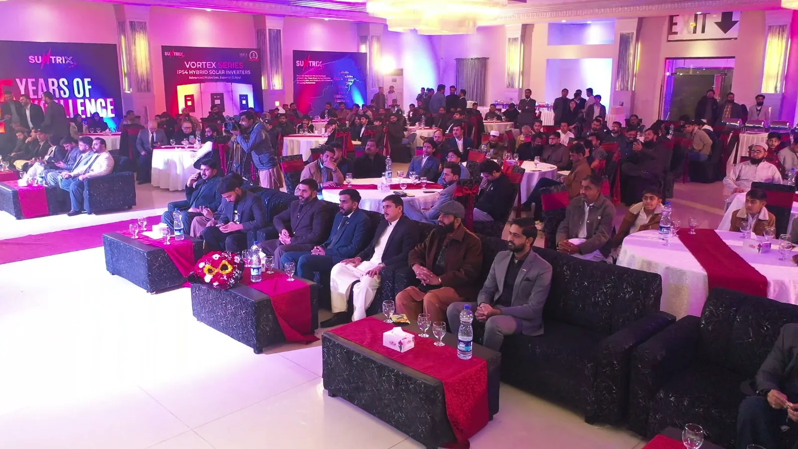 Suntrix 5 Years of Excellence event hall with printed stage backdrops and product banners installed